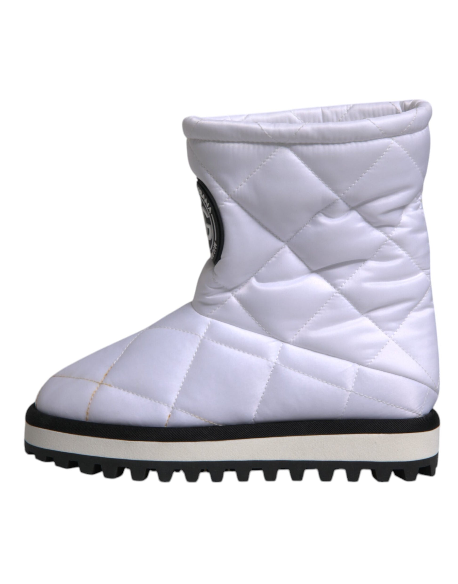 White quilted snow boot with black trim