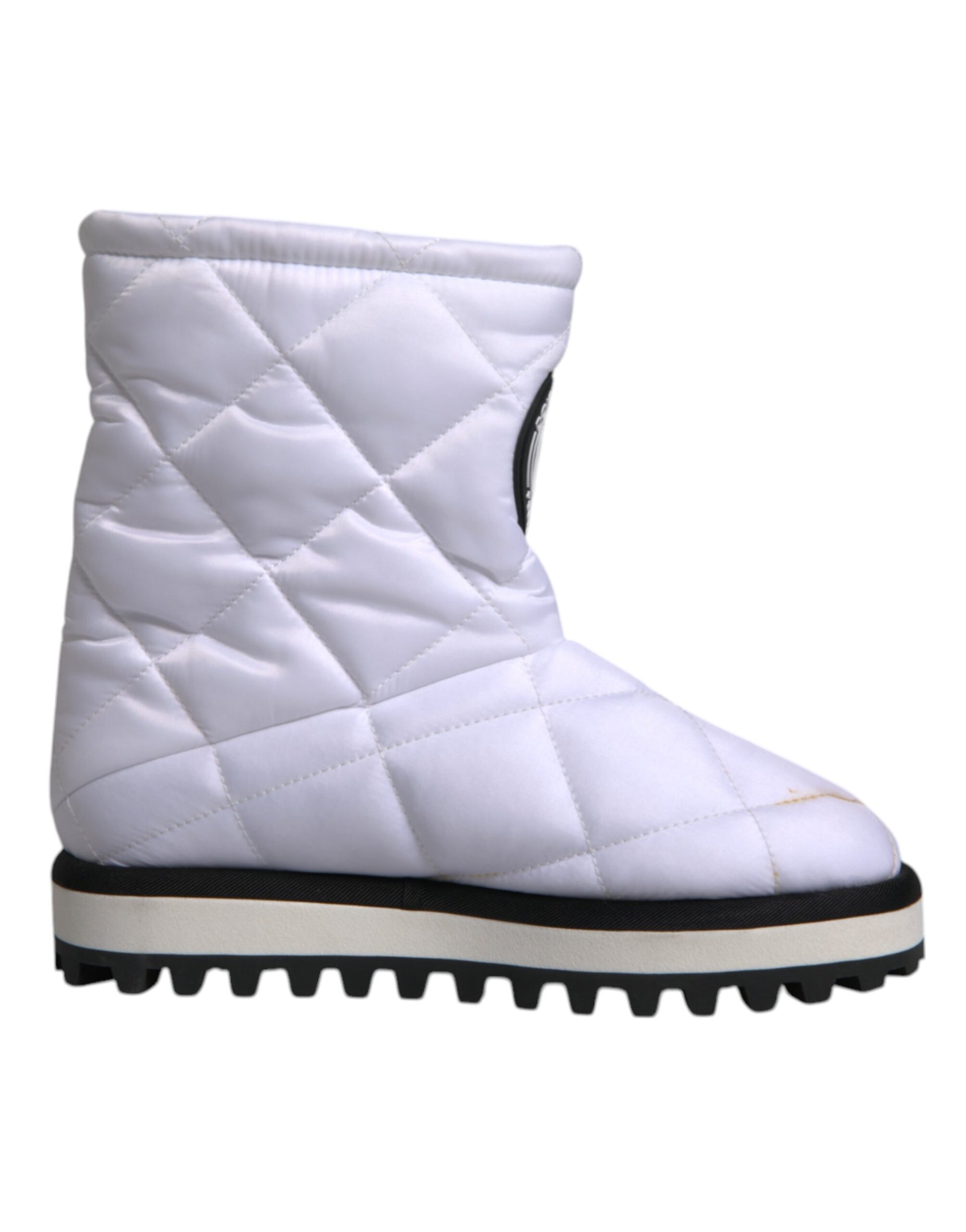 White quilted snow boot with black trim