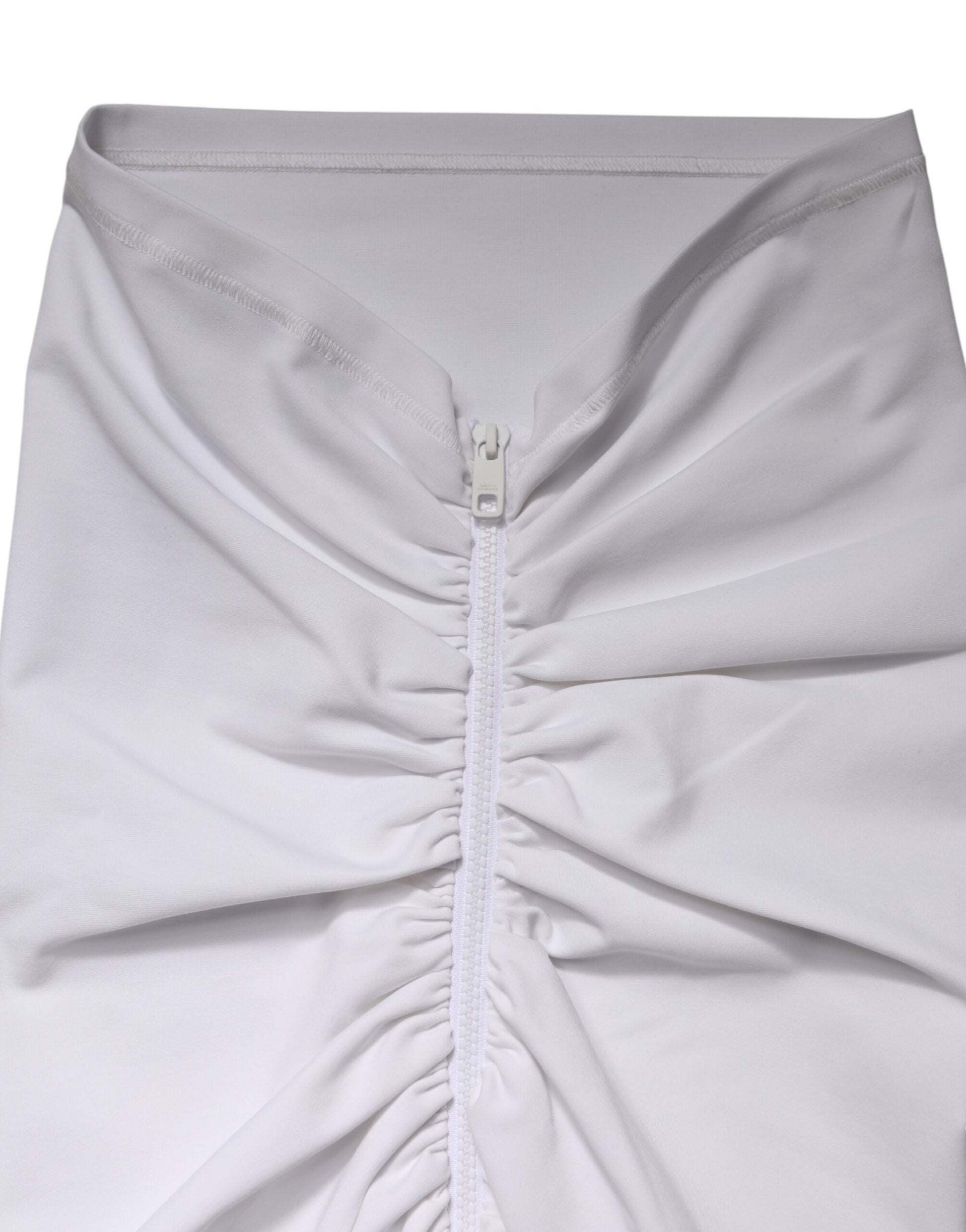 White skirt with ruffles and zipper in front