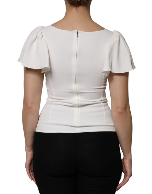 White blouse with ruffled sleeves