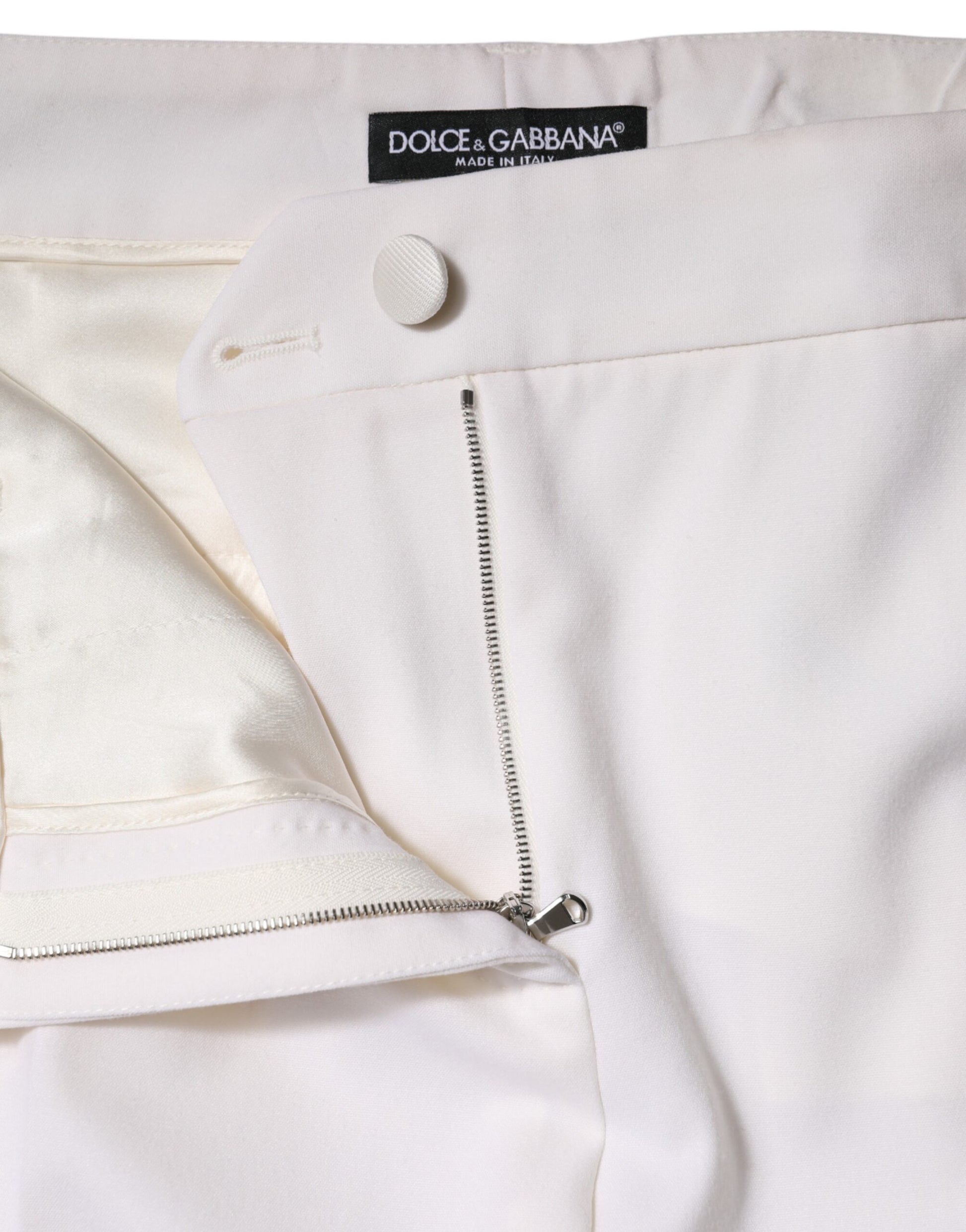 Pair of pants with zippered side pockets
