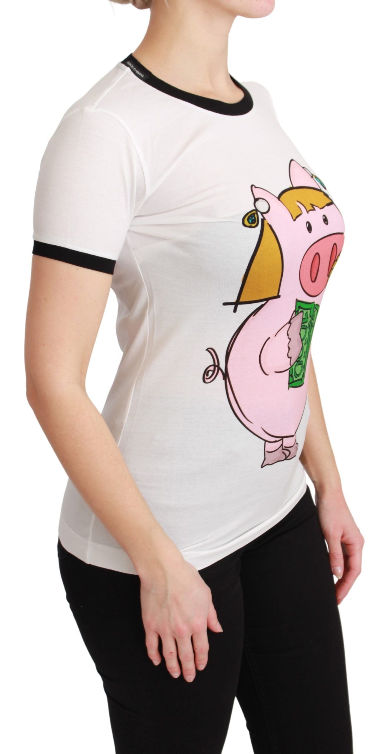 A woman wearing a white t-shirt with a pig design on it