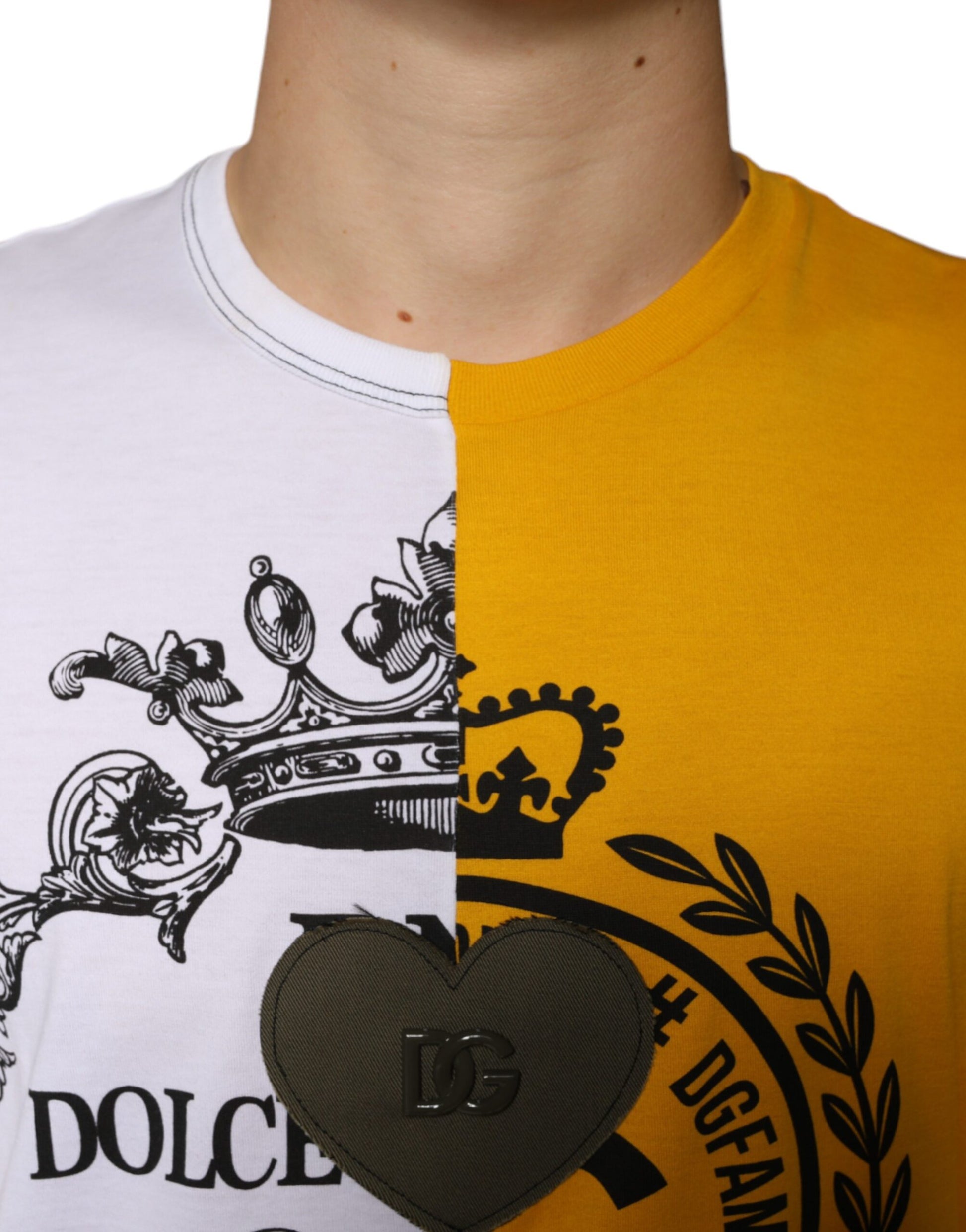 Man wearing white shirt with heart on front and yellow shirt with crown logo