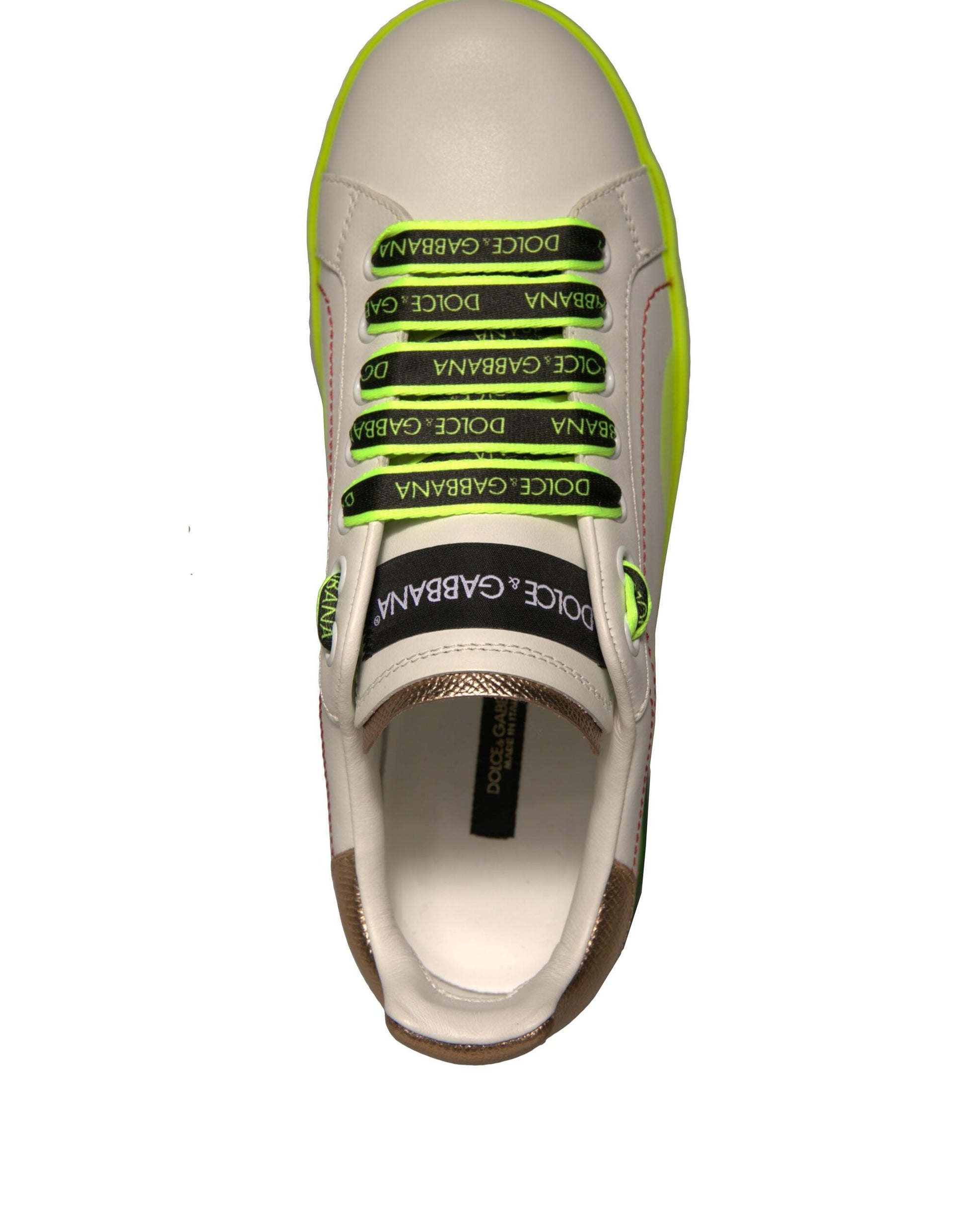 White sneaker with green stripes on side