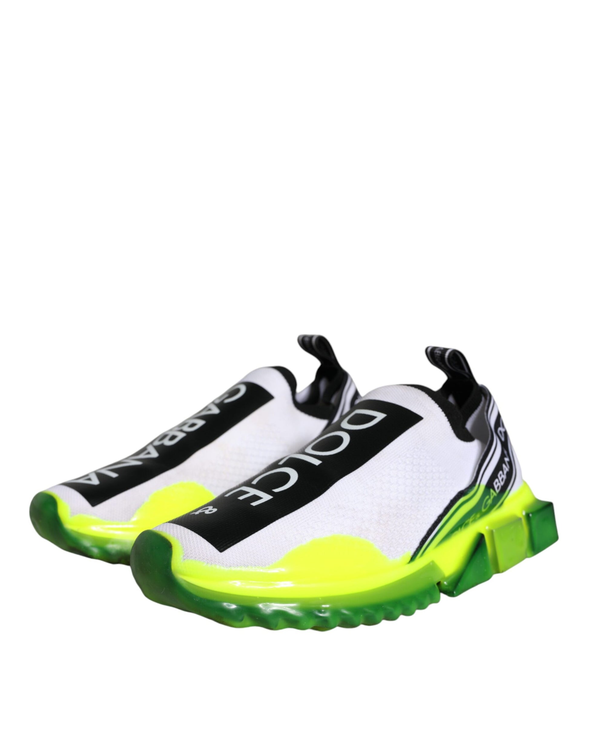 White and yellow slip-on shoes with black text, featuring a design that suggests comfort and style