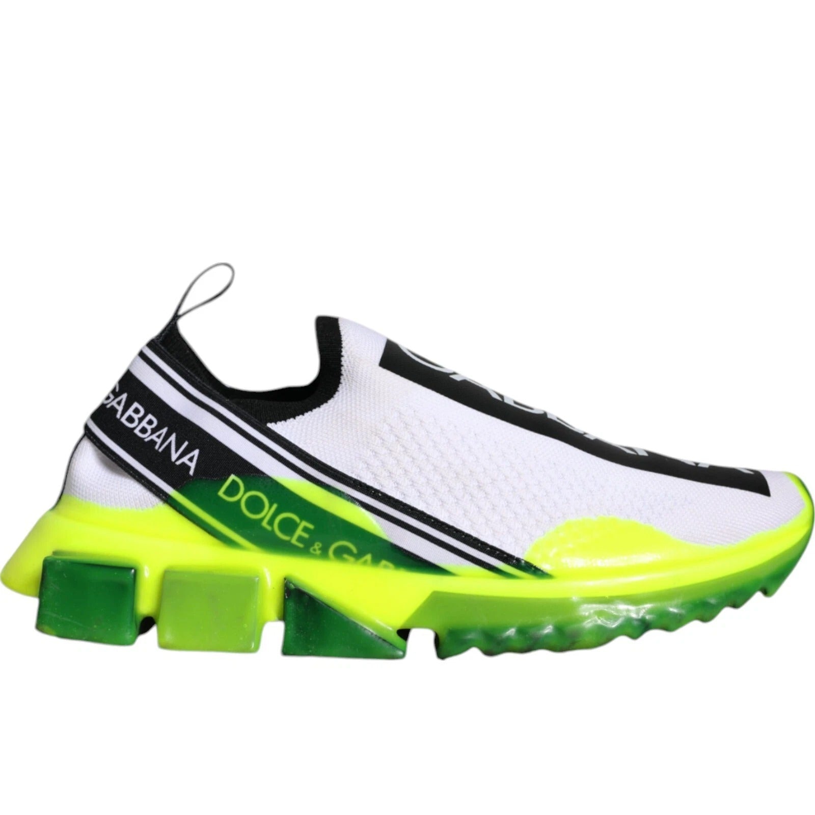White sneaker with yellow sole and black stripes