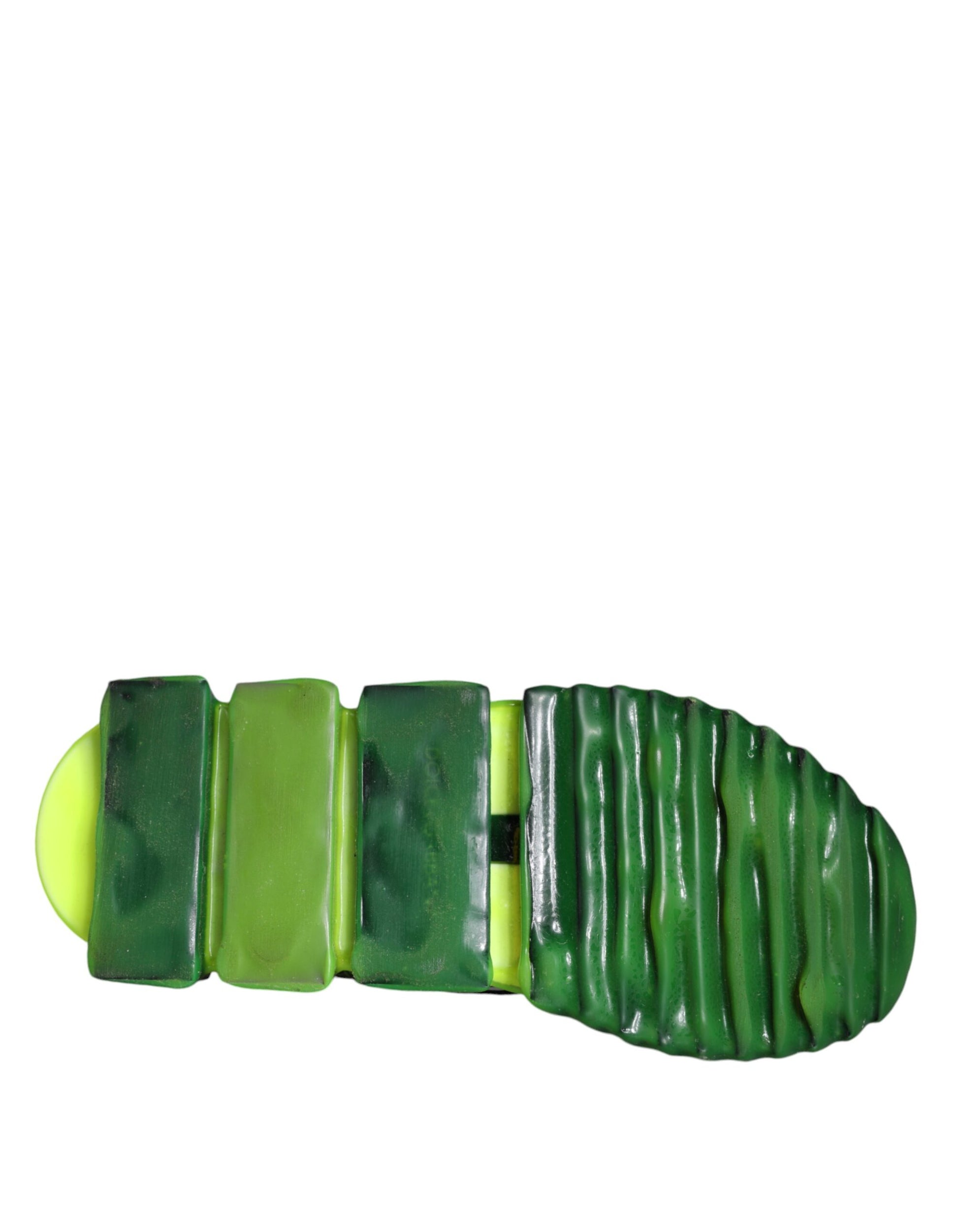 Green and yellow slip on shoes with white sole