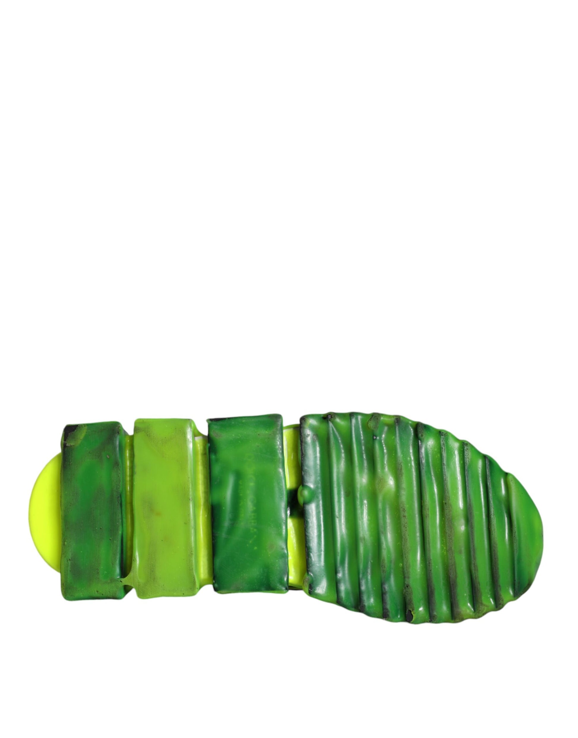 Green and yellow slip on shoes with a striped pattern