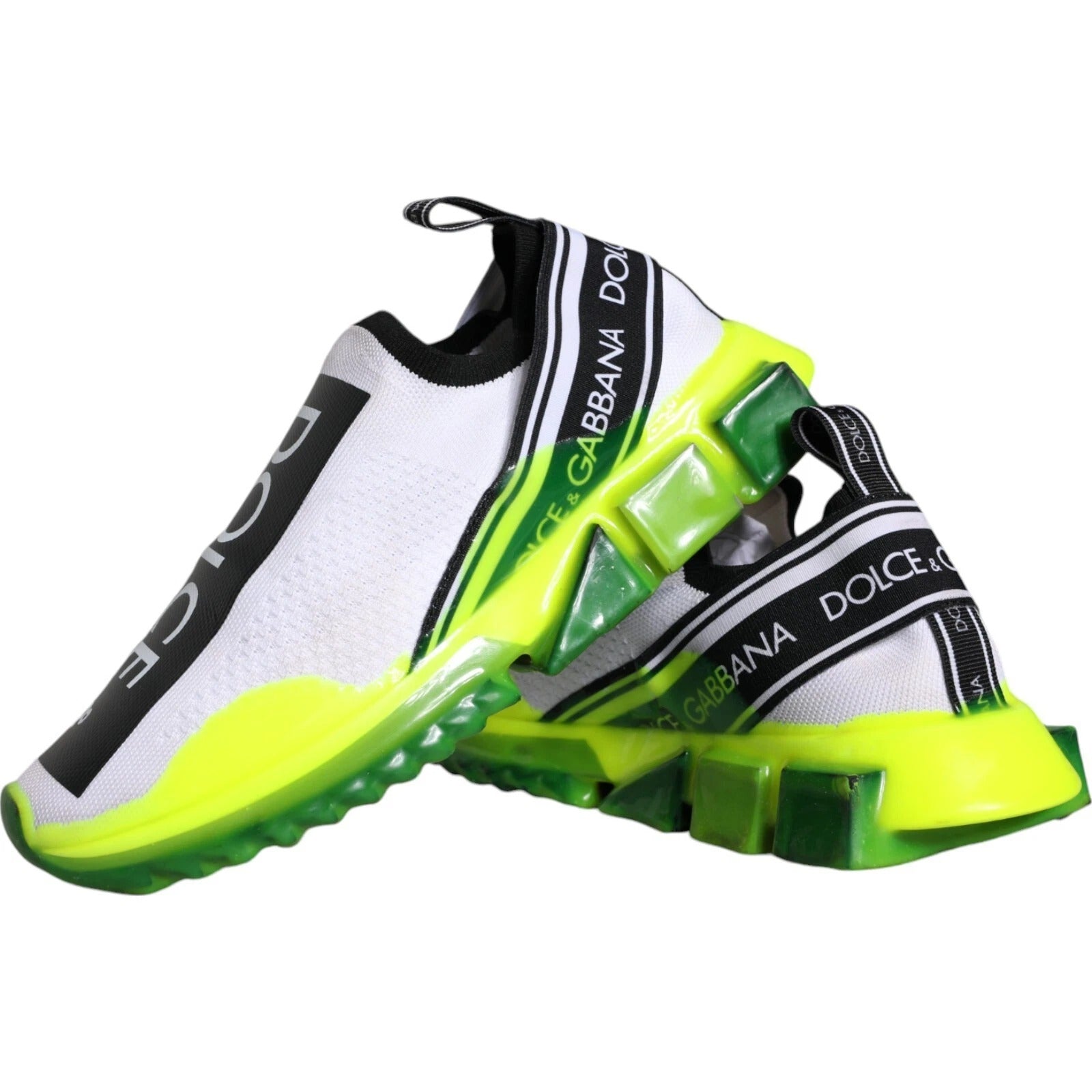 Yellow and white sneakers with black straps