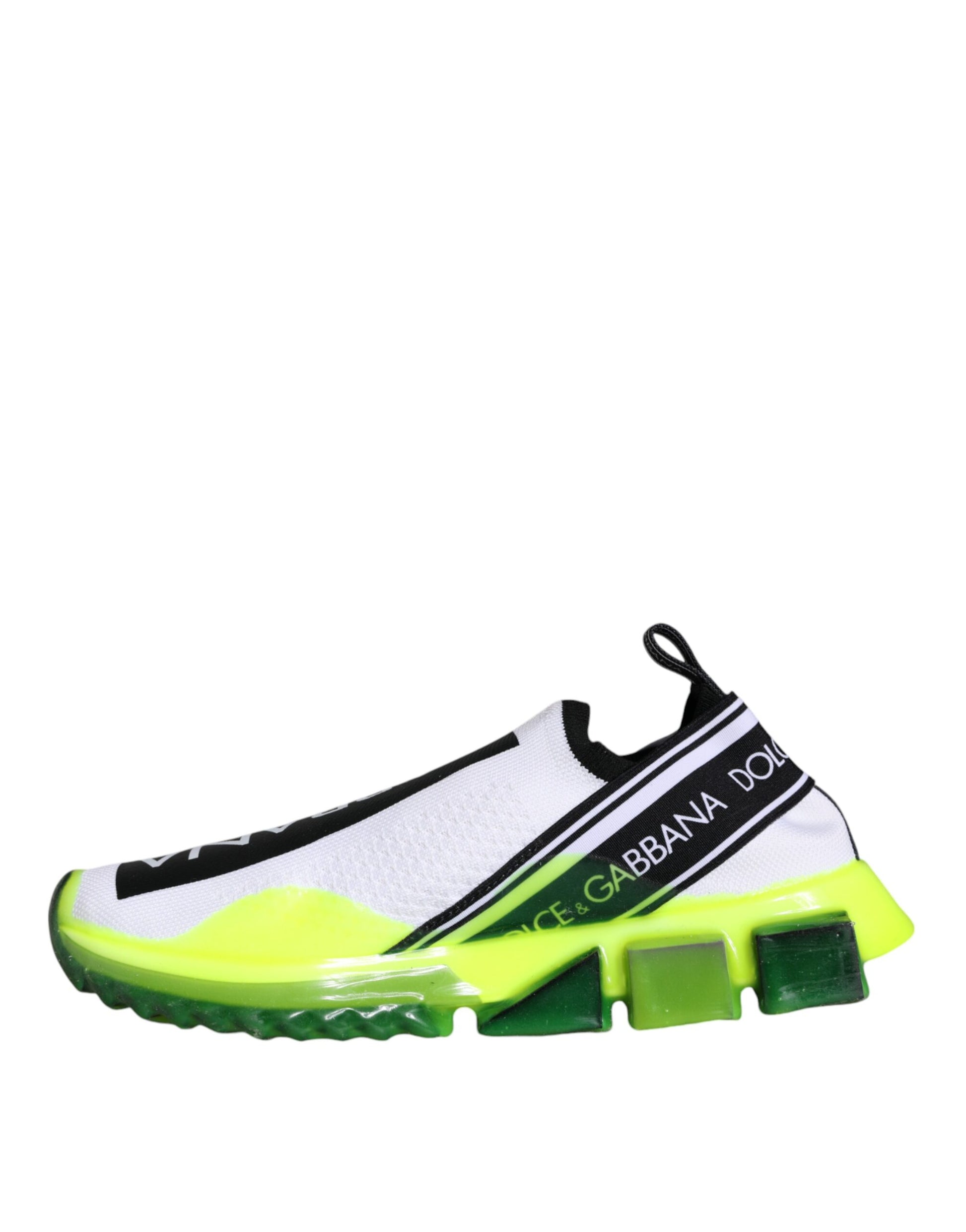 A pair of white and yellow slip-on shoes with a black logo on the side
