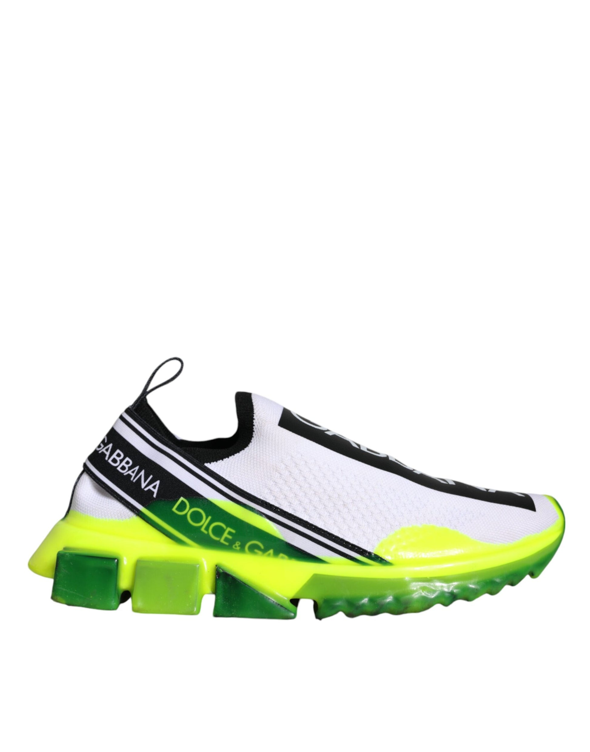A pair of white and yellow slip-on shoes with a black strap