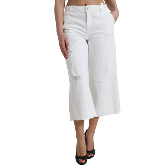 White cropped pants with distressed hem