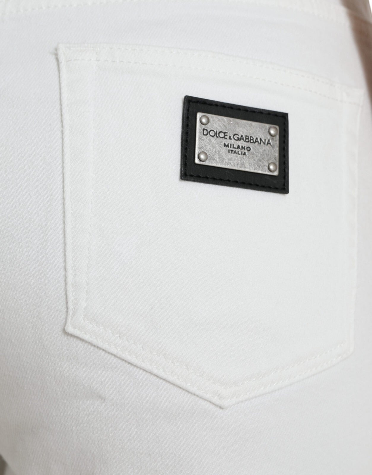White jeans with black label on pocket