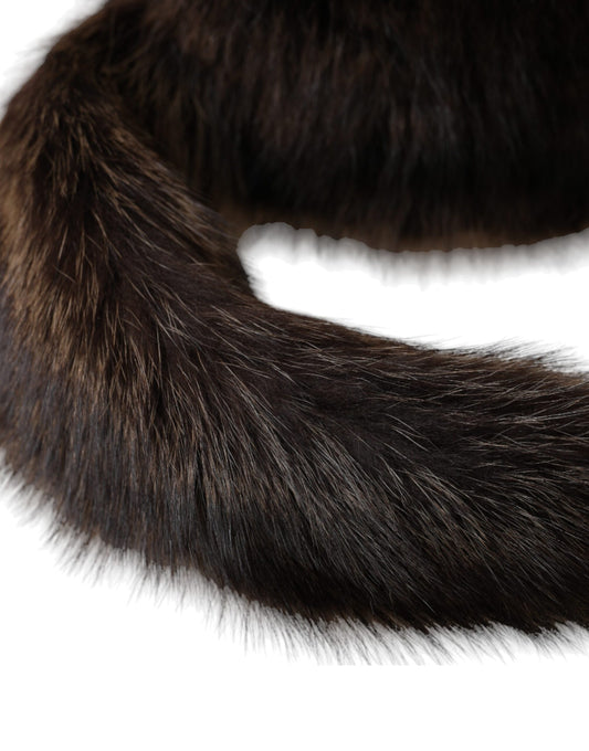The tail of a furry animal