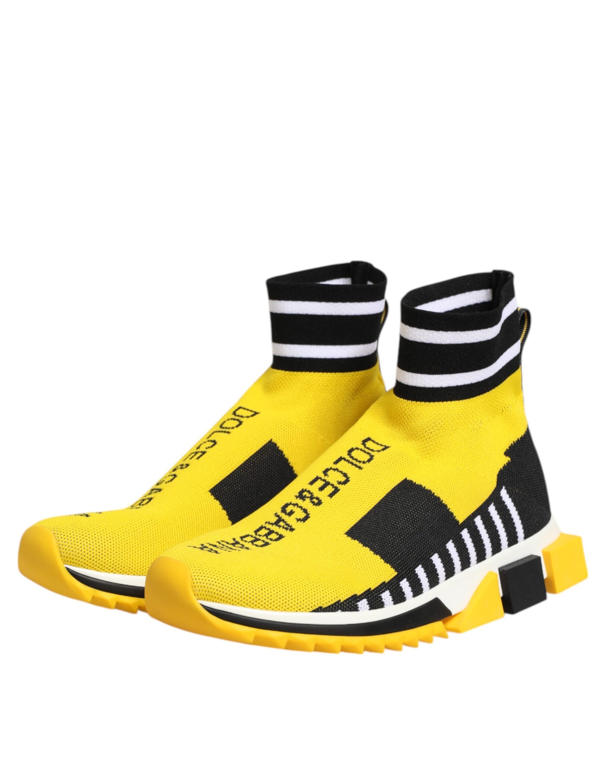 Yellow sneaker with black stripes on sides and yellow socks with black stripes