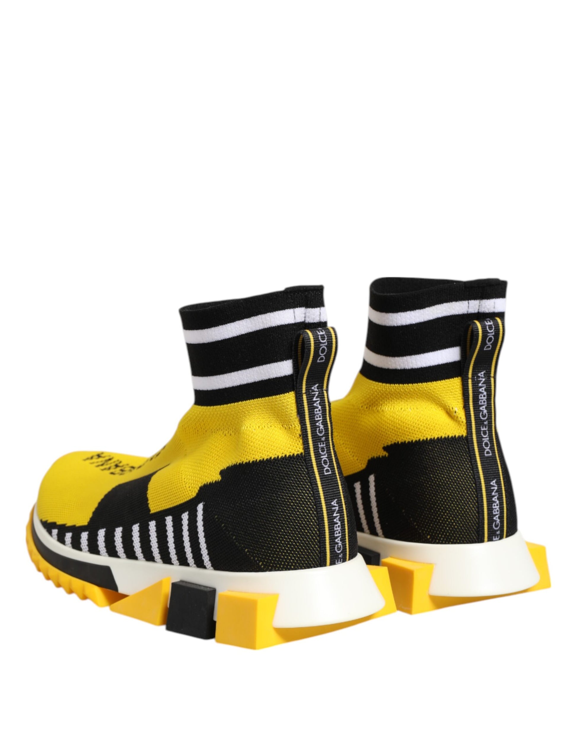 Yellow and black sneakers with white laces