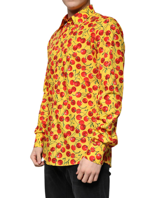 A yellow shirt with a cherry print