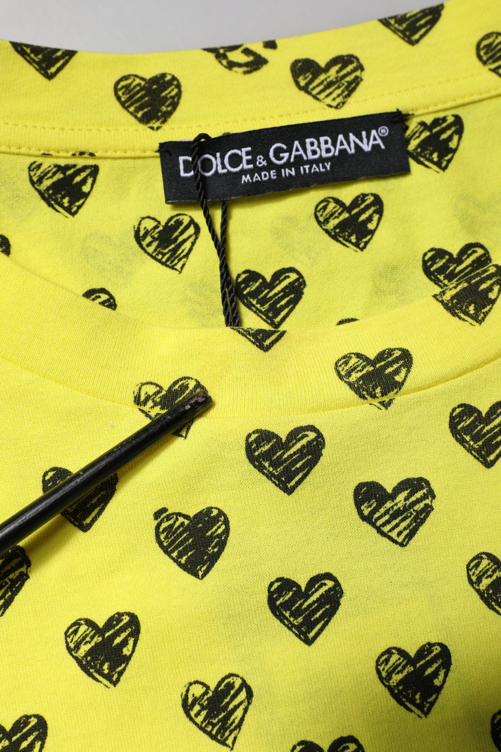 Yellow shirt with heart pattern