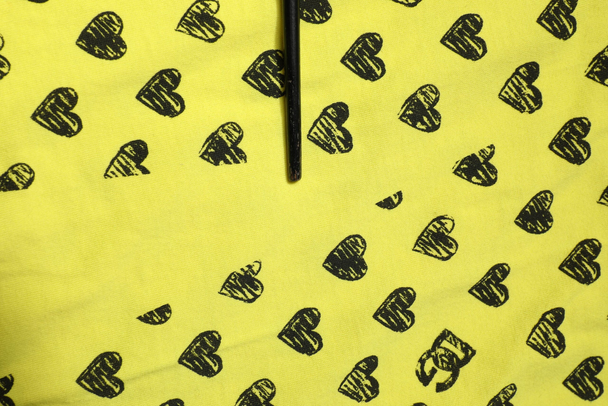 Yellow fabric with black coffee cup designs