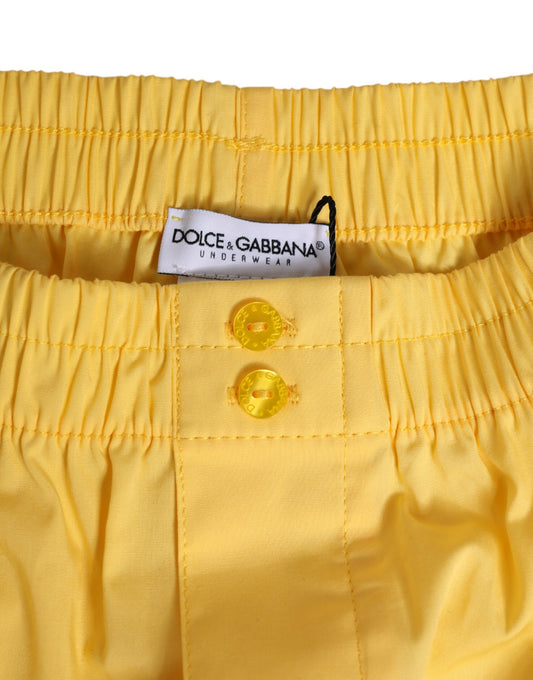 Yellow shorts with buttons on front