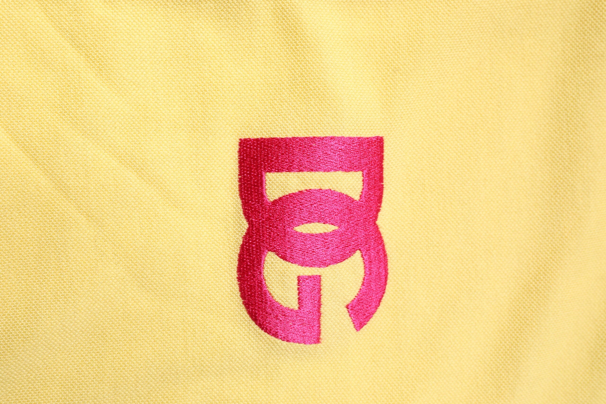 Yellow fabric with red logo