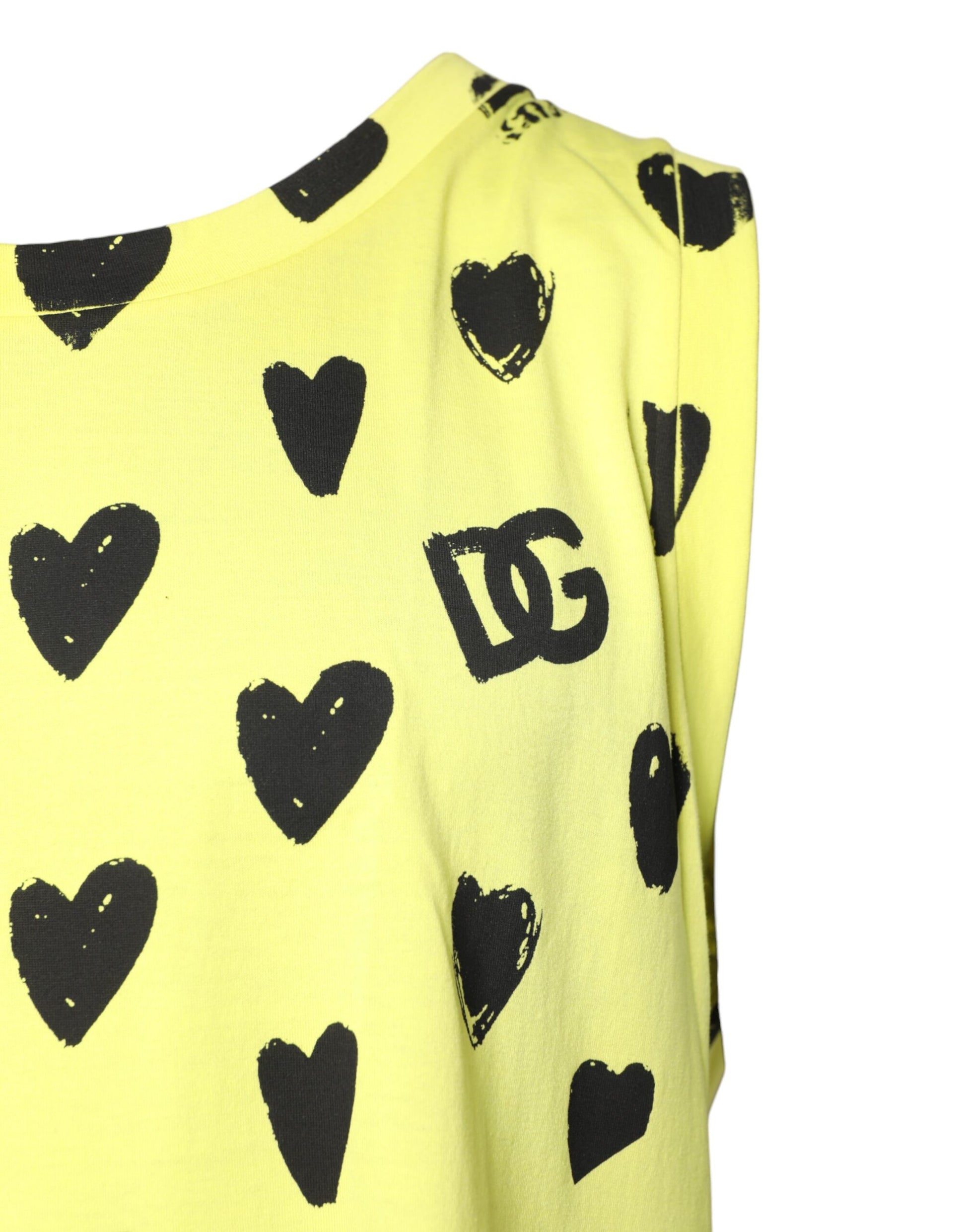 Yellow sweater with black hearts