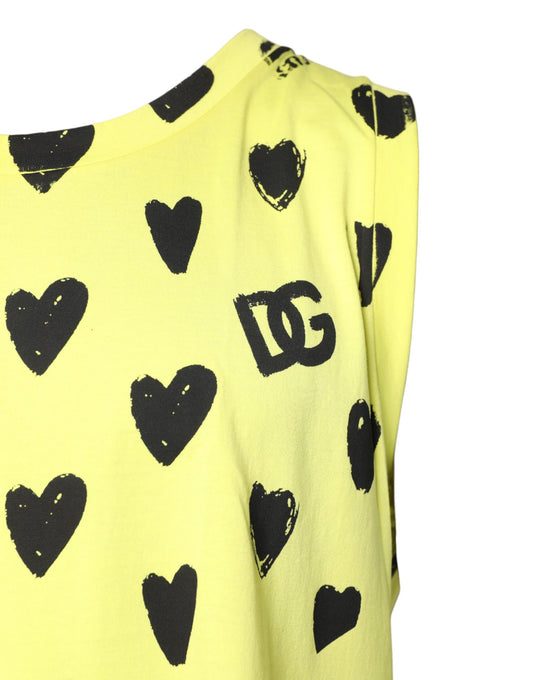 Yellow sweater with black hearts