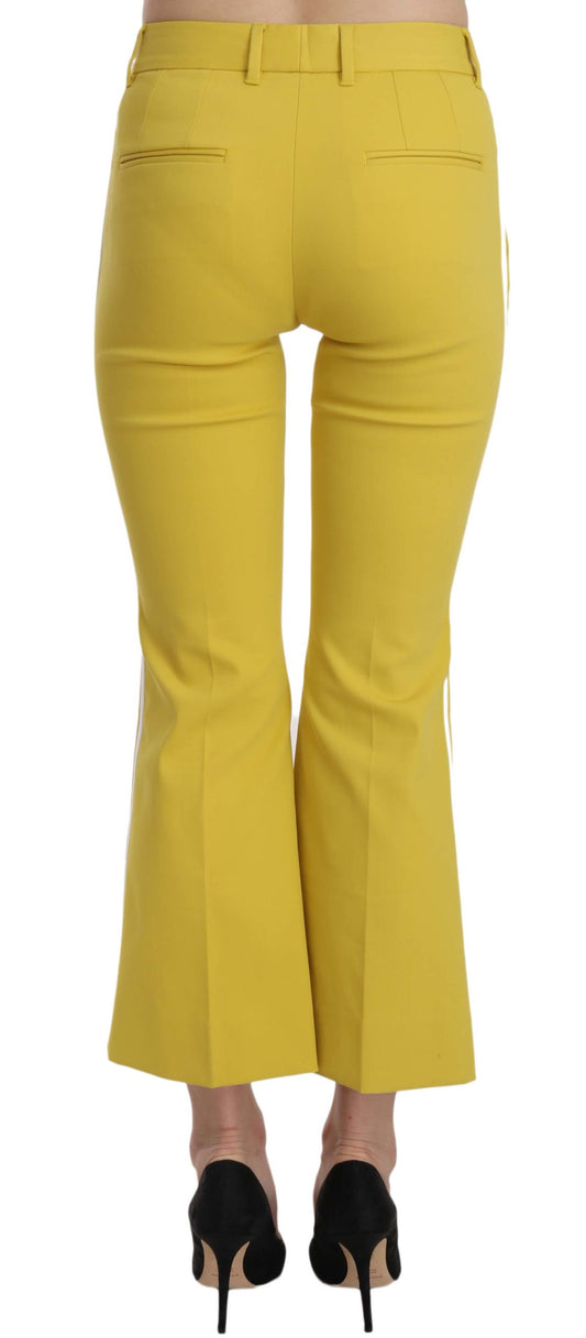 Yellow flared pants on a mannequin