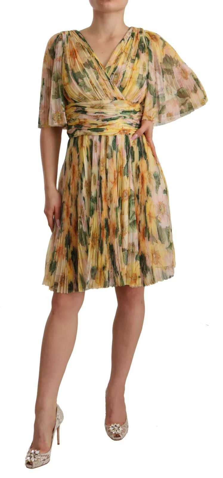 A yellow floral print pleated maxi dress by Dolce & Gabbana