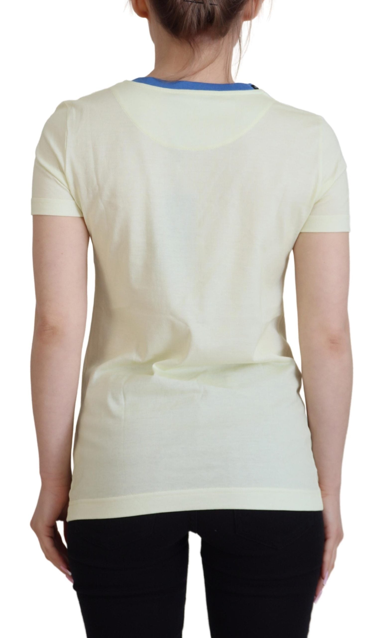 Woman's back wearing a yellow top