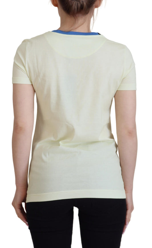 Woman's back wearing a yellow top