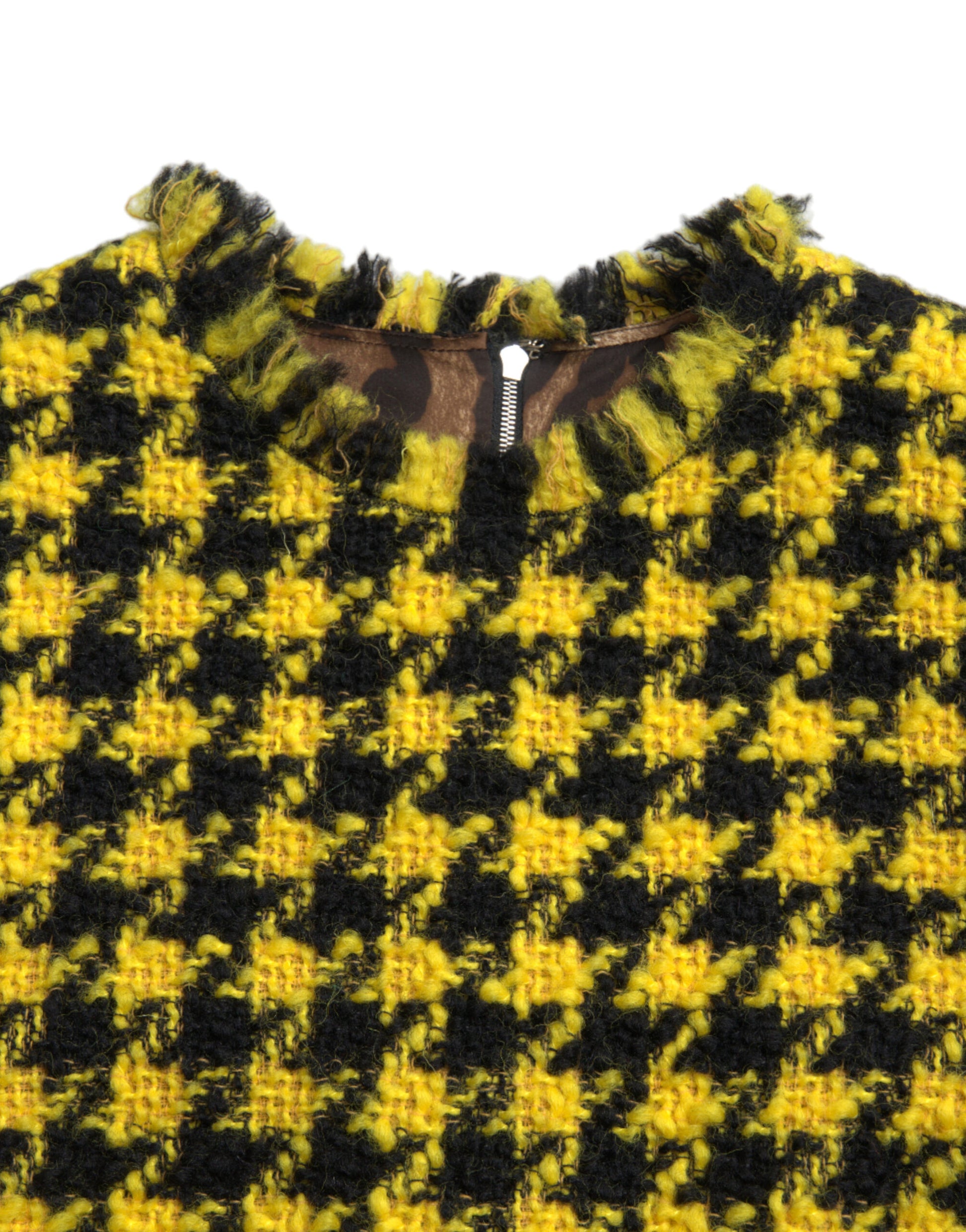 A yellow houndstooth patterned sleeveless aline mini dress