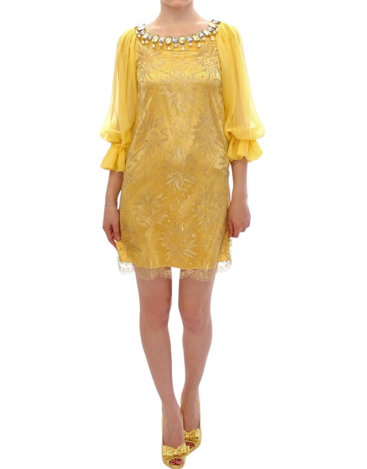 Yellow dress with ruffles on sleeves and hem