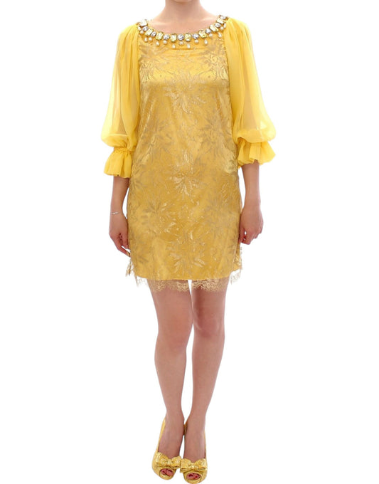 Yellow dress with ruffles on sleeves and hem