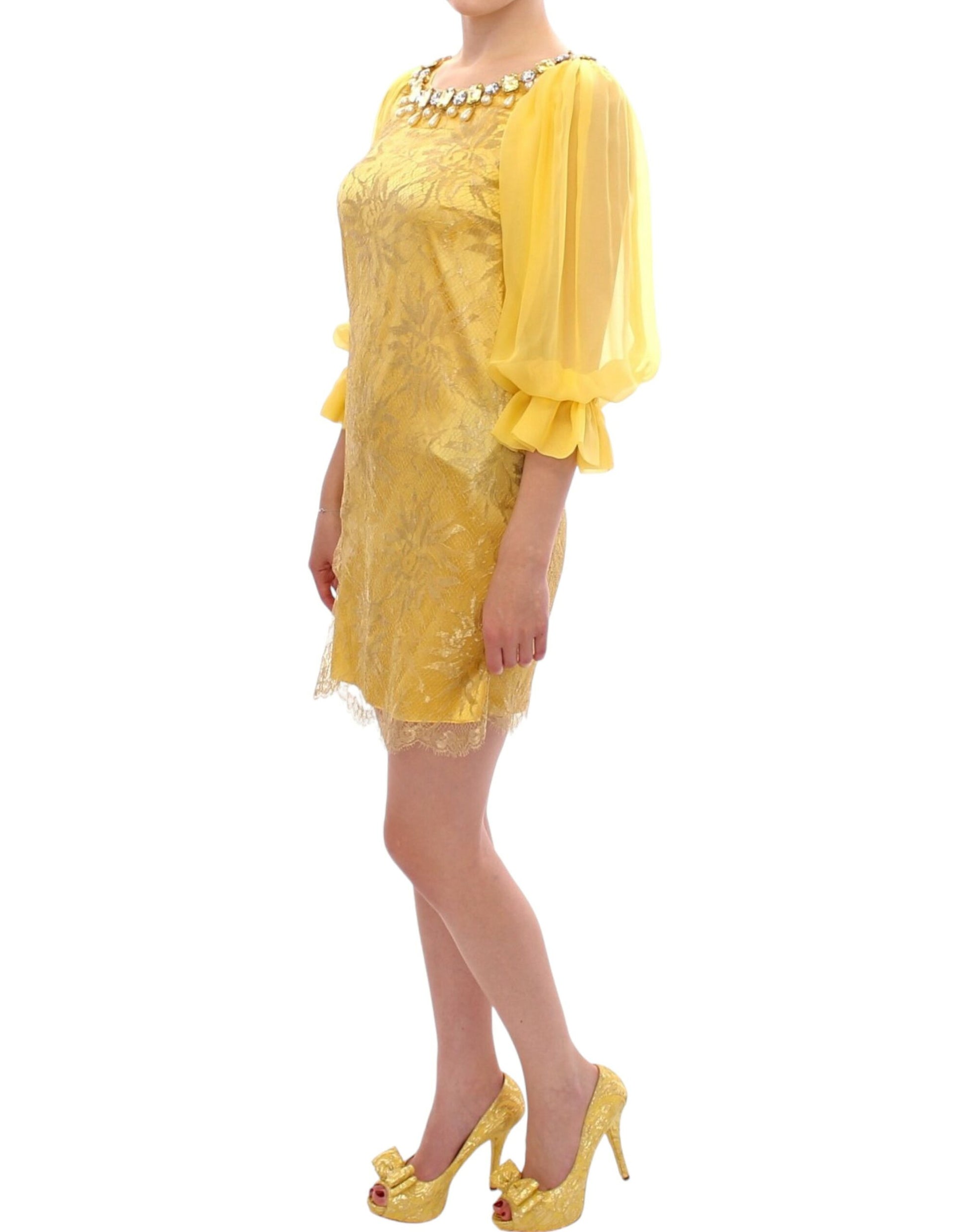 Yellow dress with ruffles on sleeves and hem