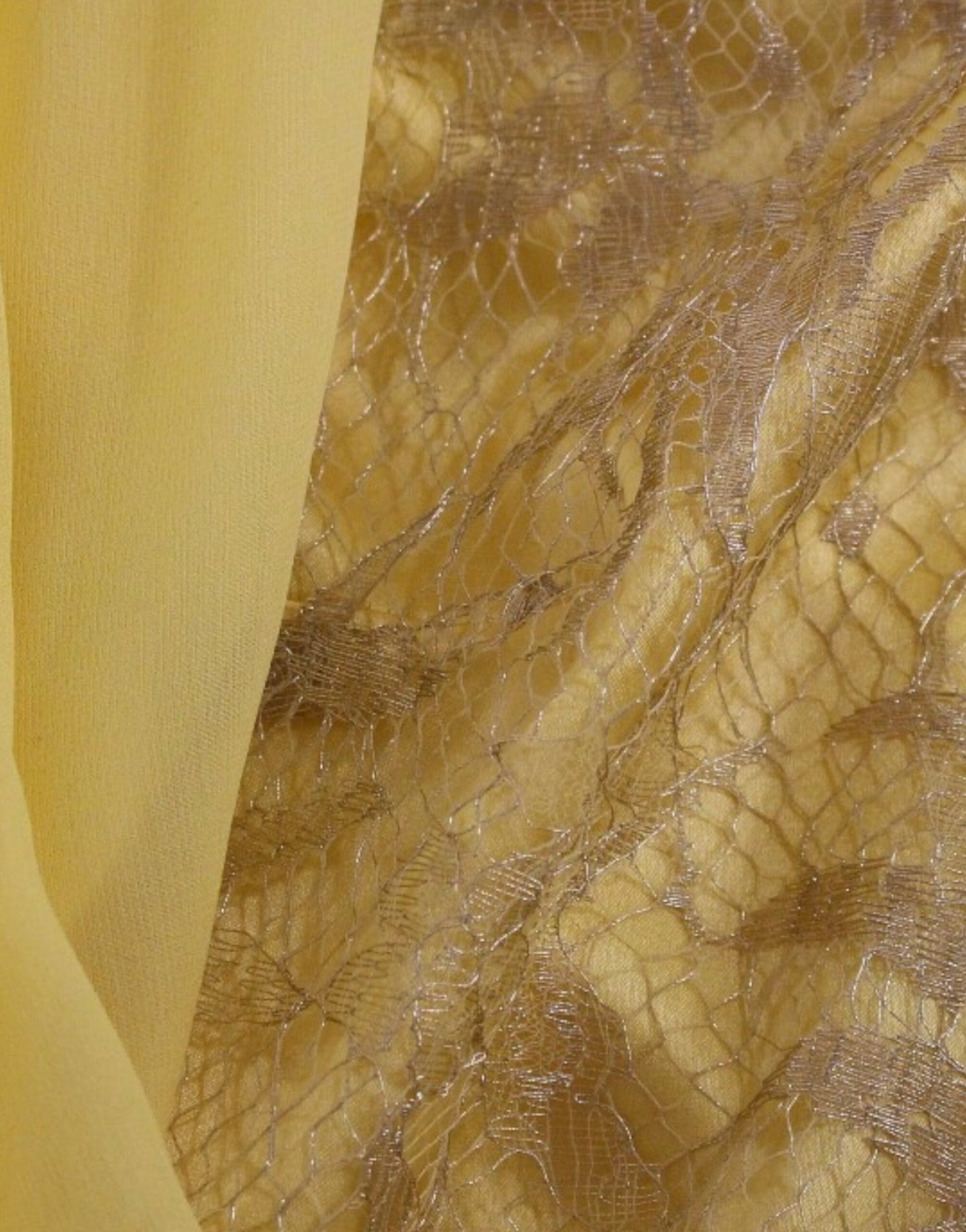 Yellow snake skin fabric with embossed pattern