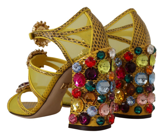 Yellow high heel shoes with rhinestones and a bow on top