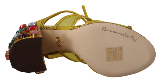Yellow high heel shoe with embellishments and a tag on the insole