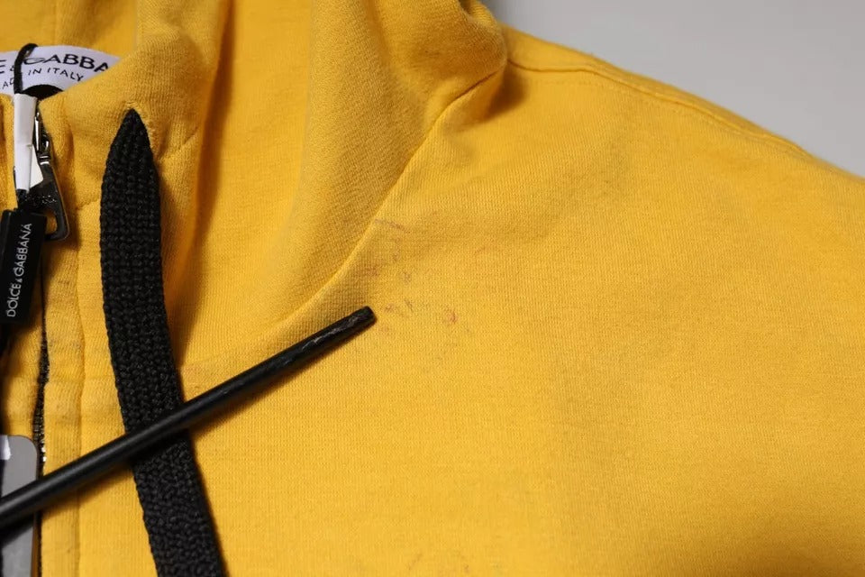 Yellow hoodie with black drawstrings