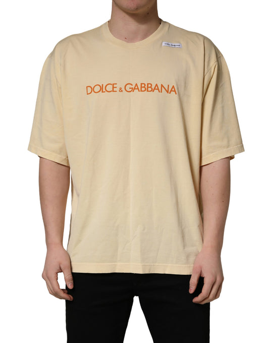 A yellow crew neck t-shirt with a logo print on the front