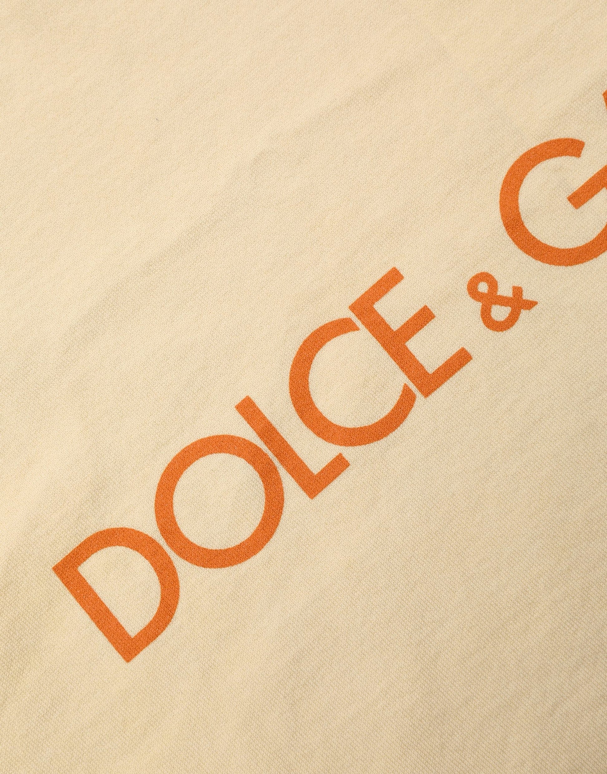 A yellow logo print crew neck t-shirt by Dolce & Gabbana
