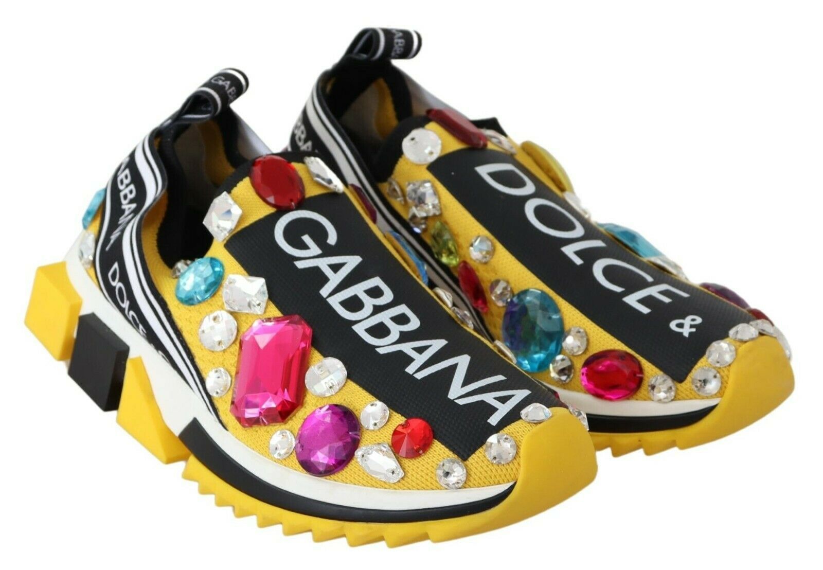 Yellow and black children's shoes with sparkling stones on them