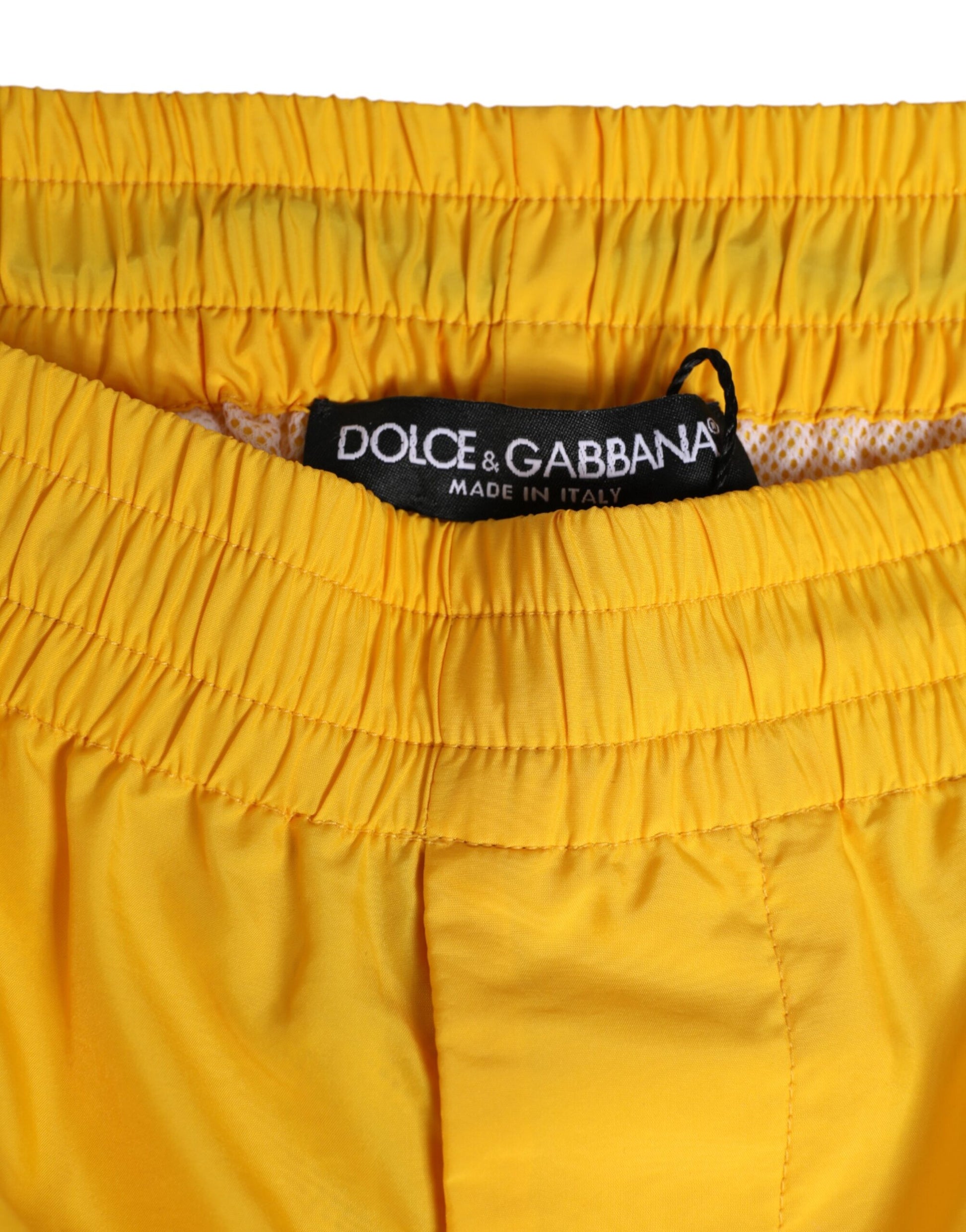 Yellow nylon boxer shorts with logo plaque