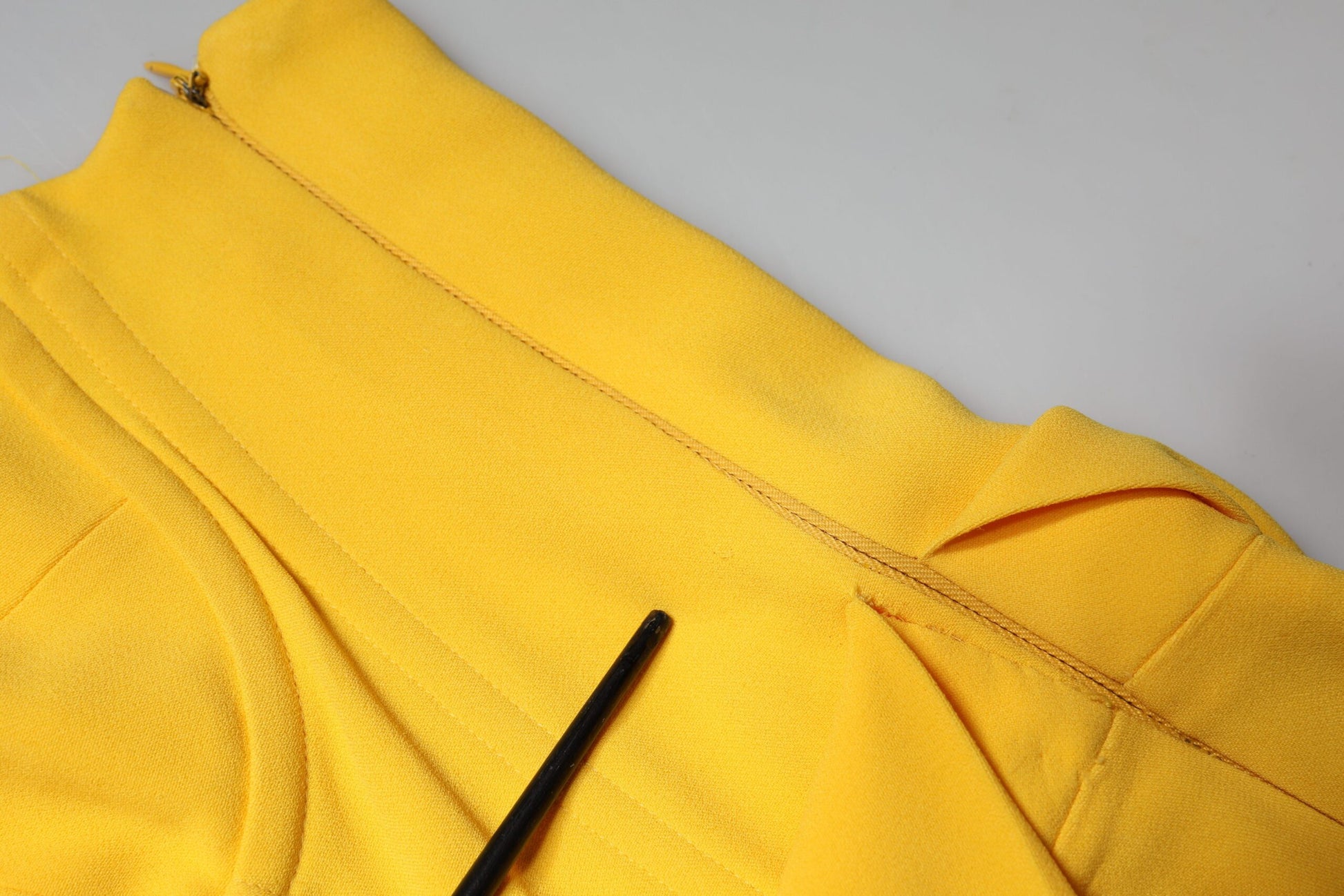 Yellow fabric with black zipper