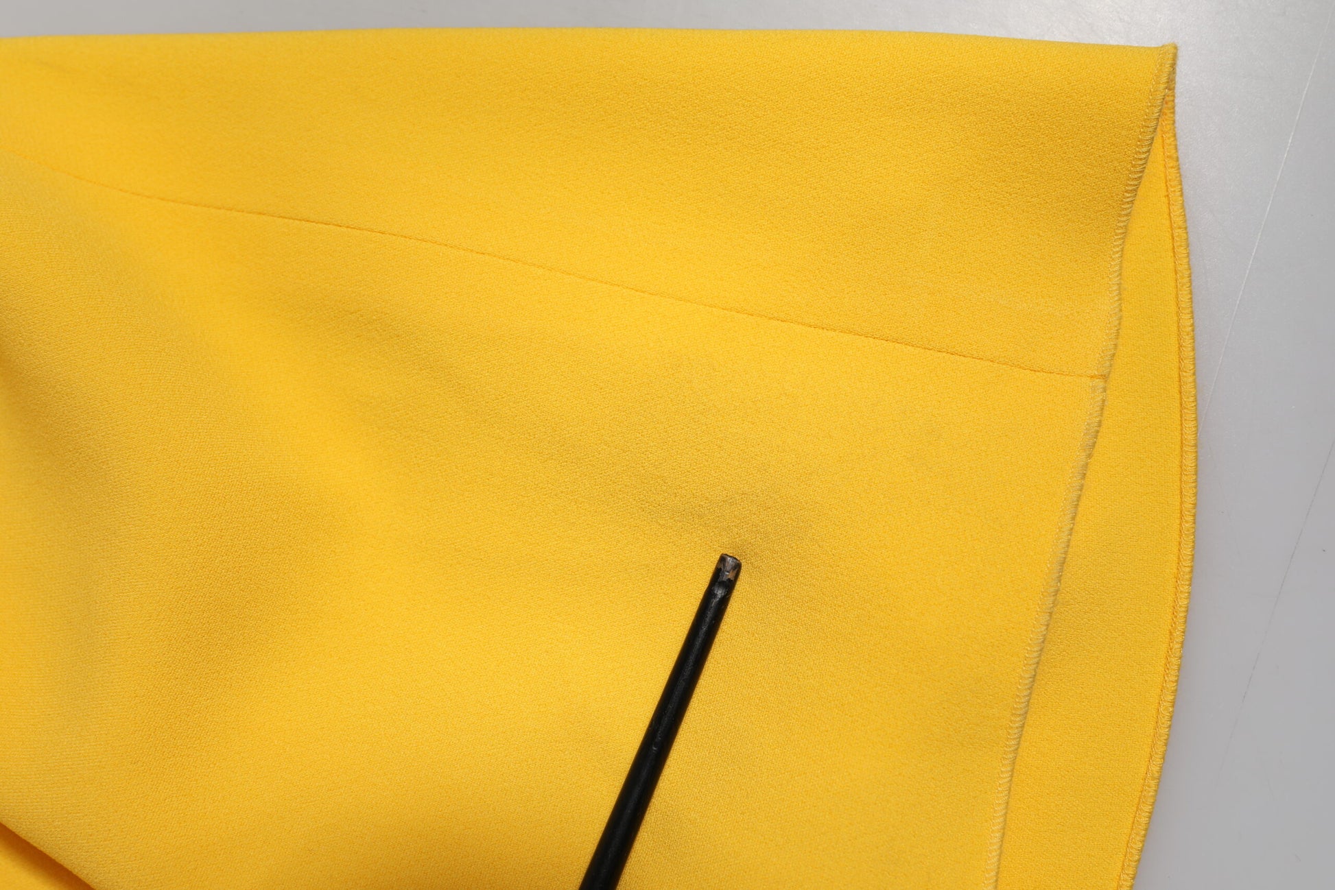 Yellow fabric with black trim