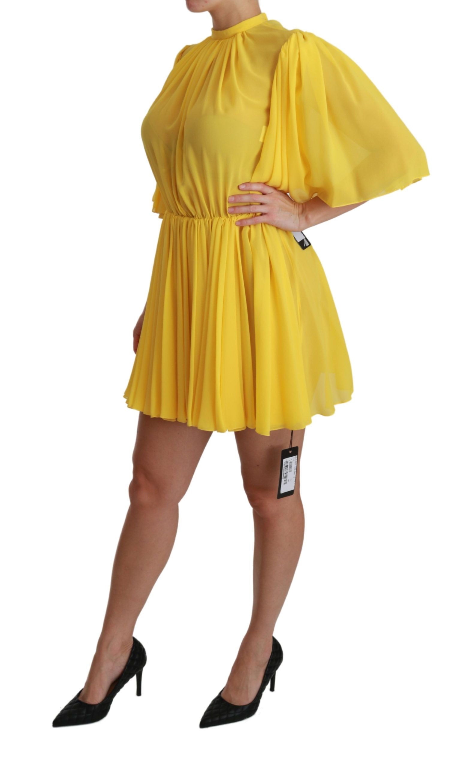 Yellow pleated dress with ruffled sleeves
