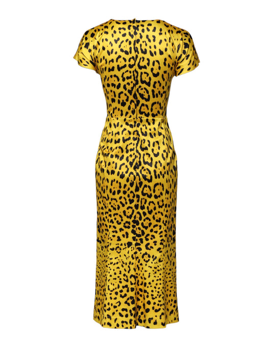 A yellow polyester leopard print midi sheath dress by Dolce & Gabbana