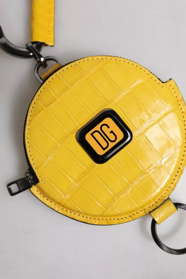 Yellow quilted leather wallet with a logo on the front