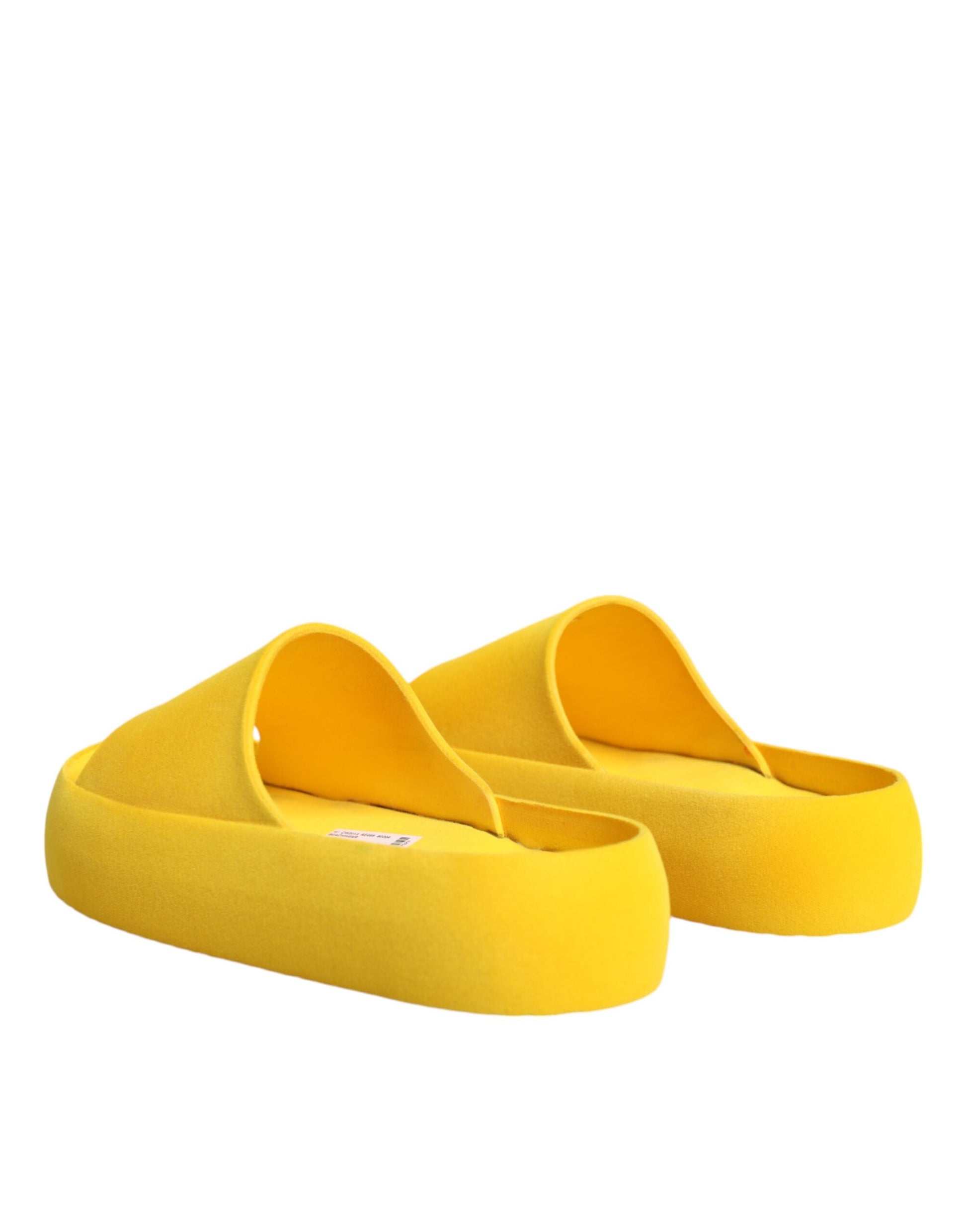 Yellow slippers on a white background