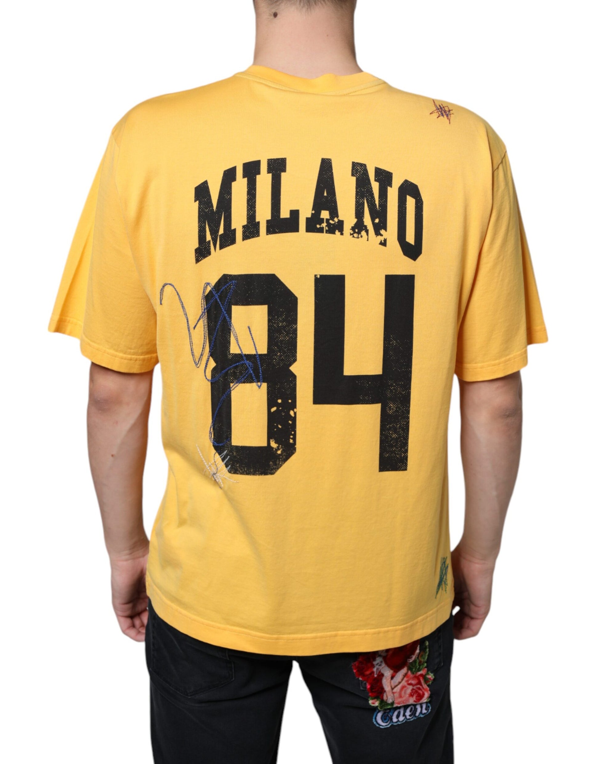 Yellow jersey with black number 84